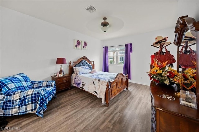 20025 Lake Vista Cir Unit 6B, Lehigh Acres, FL 33936 - bedroom featuring wood finished floors, baseboards, and ceiling fan