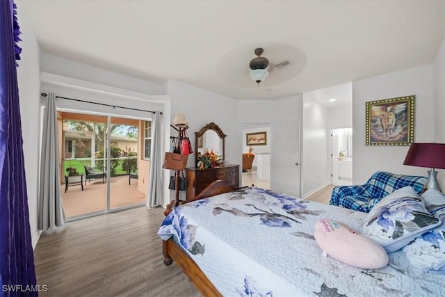 20025 Lake Vista Cir Unit 6B, Lehigh Acres, FL 33936 - bedroom with access to exterior, wood finished floors, ensuite bath, baseboards, and recessed lighting