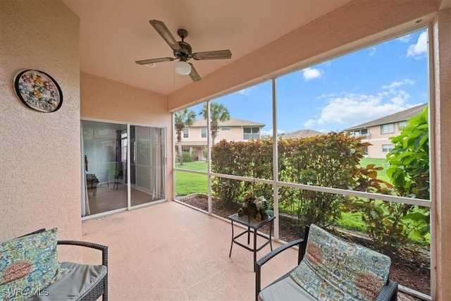 20025 Lake Vista Cir Unit 6B, Lehigh Acres, FL 33936 - unfurnished sunroom with a ceiling fan
