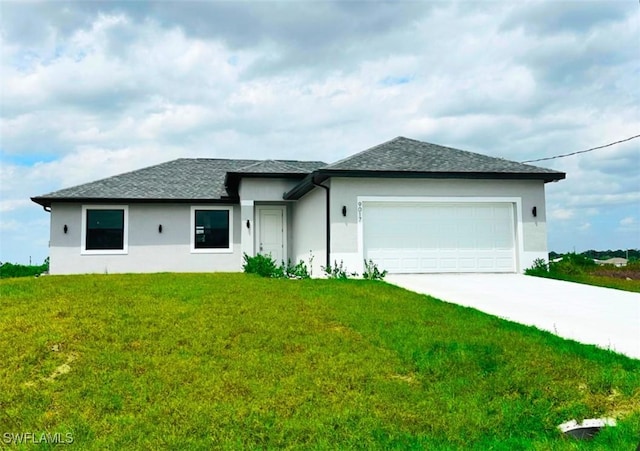 9017 Meadow Cir, Labelle, FL 33935 - view of front of property with stucco siding, concrete driveway, an attached garage, and a front lawn