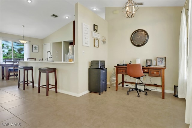 2223 SW 16th Ter, Cape Coral, FL 33991 - office space featuring vaulted ceiling, baseboards, a sink, and a chandelier