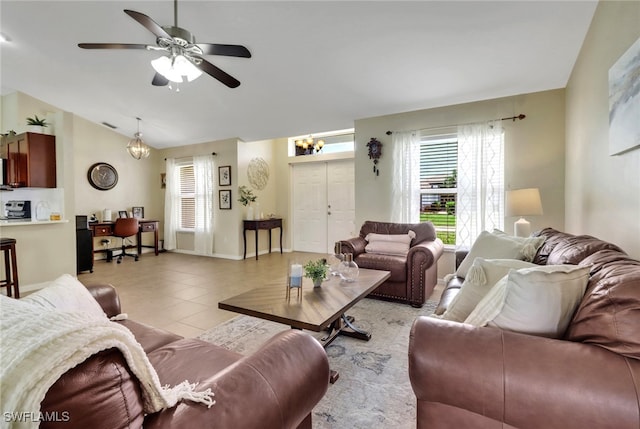 2223 SW 16th Ter, Cape Coral, FL 33991 - living area featuring lofted ceiling, an office area, ceiling fan, light tile patterned floors, and baseboards