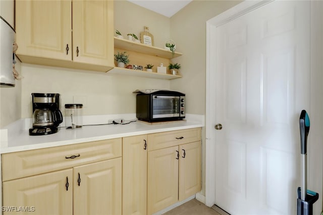 2223 SW 16th Ter, Cape Coral, FL 33991 - kitchen with light countertops and open shelves