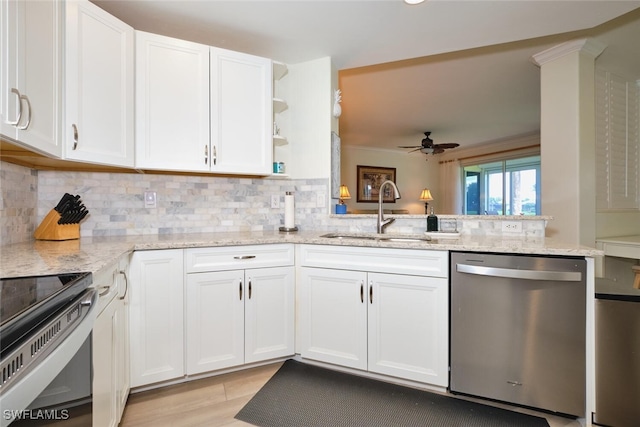9110 Bayberry Bnd Unit 102, Fort Myers, FL 33908 - kitchen with dishwasher, a sink, ceiling fan, white cabinets, and light stone counters