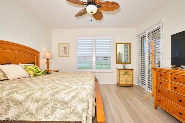 9110 Bayberry Bnd Unit 102, Fort Myers, FL 33908 - bedroom with light wood-style flooring, a ceiling fan, and baseboards