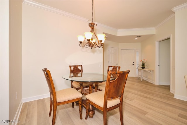 9110 Bayberry Bnd Unit 102, Fort Myers, FL 33908 - dining room featuring light wood finished floors, crown molding, a chandelier, and baseboards