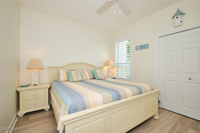 9110 Bayberry Bnd Unit 102, Fort Myers, FL 33908 - bedroom featuring light wood-type flooring, a closet, a ceiling fan, and baseboards