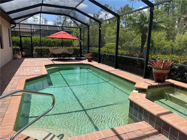 11010 Longwing Dr, Fort Myers, FL 33912 - view of pool with a patio, a pool with connected hot tub, and a lanai
