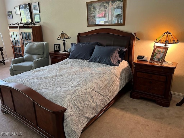 11010 Longwing Dr, Fort Myers, FL 33912 - bedroom with carpet flooring and baseboards