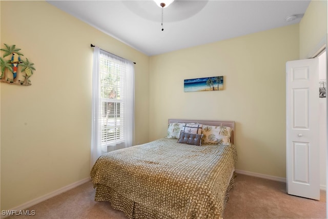 bedroom featuring carpet floors and a ceiling fan