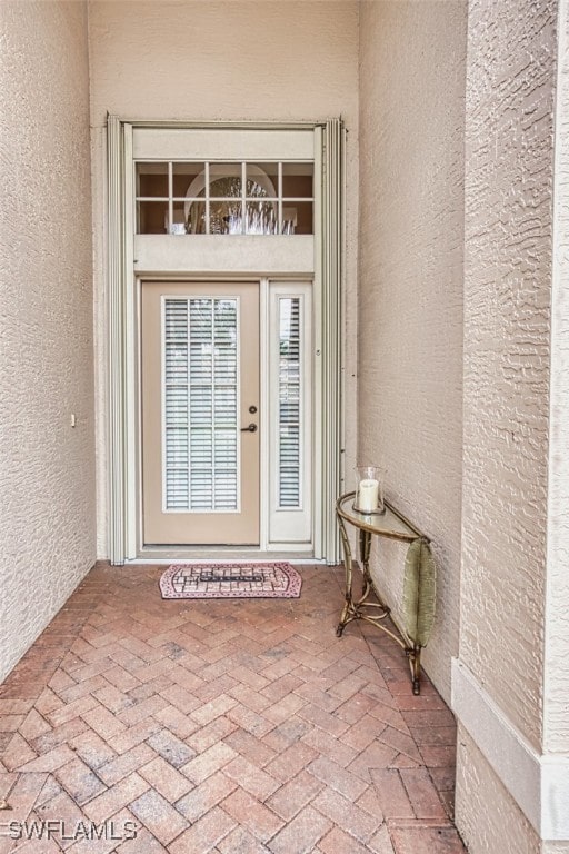 9211 Independence Way, Fort Myers, FL 33913 - entrance to property featuring stucco siding