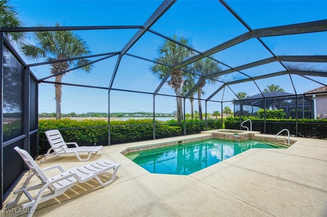 9211 Independence Way, Fort Myers, FL 33913 - view of swimming pool with a patio area, a pool with connected hot tub, and glass enclosure