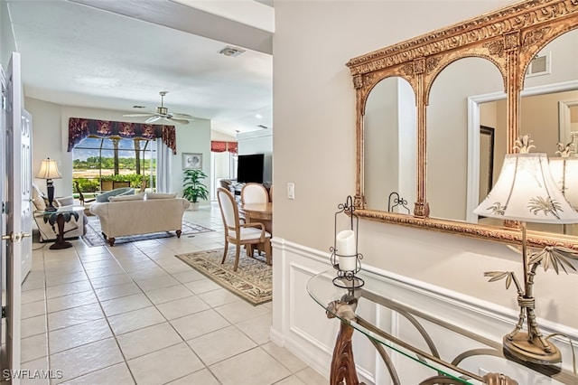 9211 Independence Way, Fort Myers, FL 33913 - hall with light tile patterned floors and wainscoting