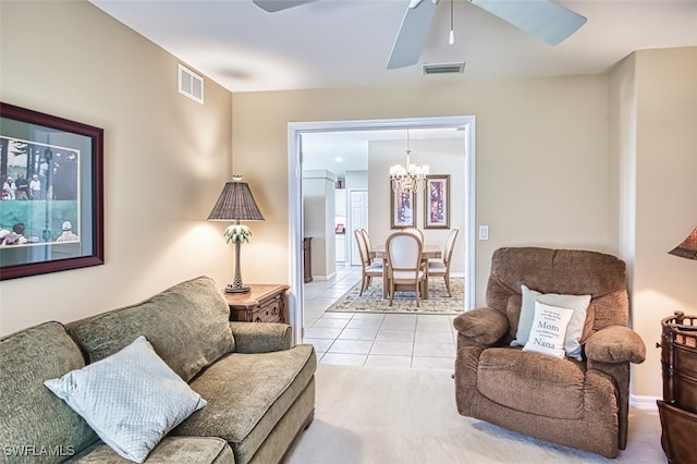 9211 Independence Way, Fort Myers, FL 33913 - tiled living area with a ceiling fan and a chandelier
