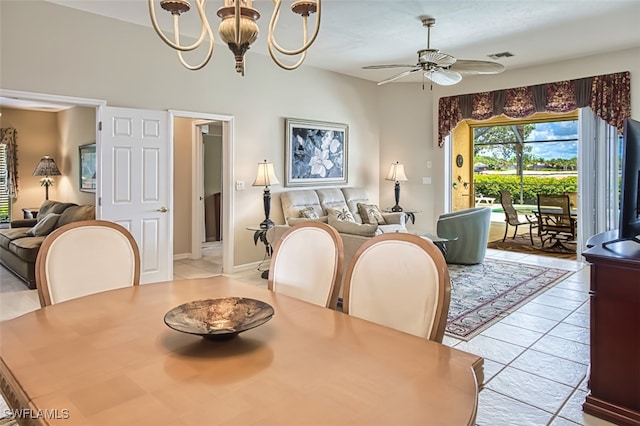 9211 Independence Way, Fort Myers, FL 33913 - dining room featuring a chandelier, a ceiling fan, and light tile patterned floors