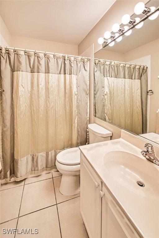 9211 Independence Way, Fort Myers, FL 33913 - bathroom featuring vanity, tile patterned flooring, and a shower with curtain