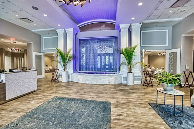 9211 Independence Way, Fort Myers, FL 33913 - reception with ornate columns, crown molding, and recessed lighting