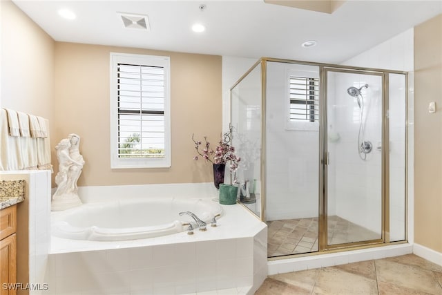 11600 Court Of Palms Unit 301, Fort Myers, FL 33908 - bathroom with a bath, a shower stall, vanity, tile patterned floors, and recessed lighting