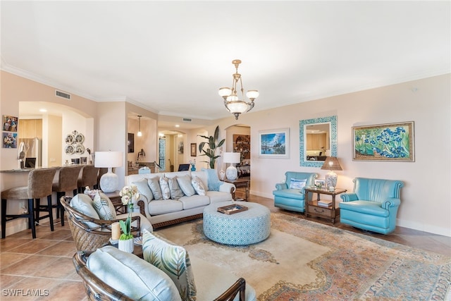 11600 Court Of Palms Unit 301, Fort Myers, FL 33908 - living area with arched walkways, ornamental molding, a chandelier, and tile patterned floors
