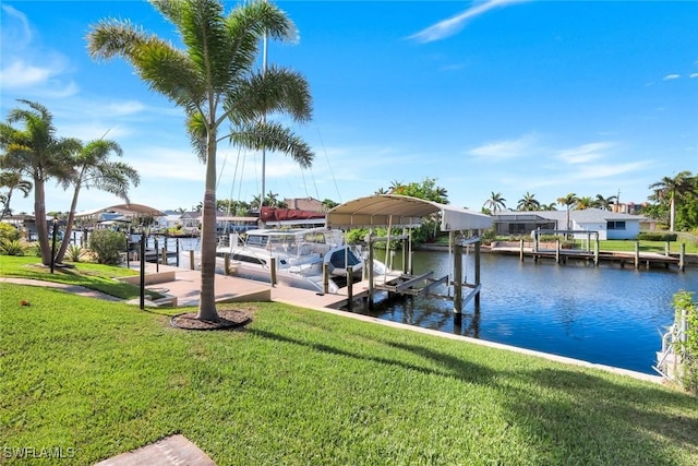 1528 SW 52nd Ln, Cape Coral, FL 33914 - dock featuring boat lift, a yard, and a water view