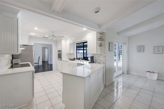 1528 SW 52nd Ln, Cape Coral, FL 33914 - kitchen with stainless steel appliances, light tile patterned flooring, beamed ceiling, decorative backsplash, and light countertops