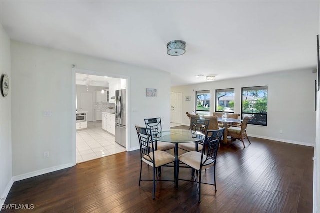 1528 SW 52nd Ln, Cape Coral, FL 33914 - dining space with hardwood / wood-style floors and baseboards