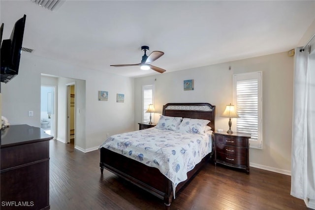 1528 SW 52nd Ln, Cape Coral, FL 33914 - bedroom featuring dark wood-style flooring, baseboards, and ceiling fan