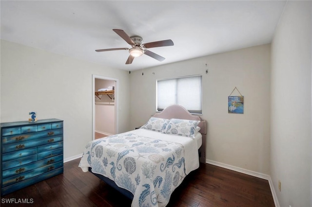 1528 SW 52nd Ln, Cape Coral, FL 33914 - bedroom with baseboards, wood finished floors, ceiling fan, and a closet