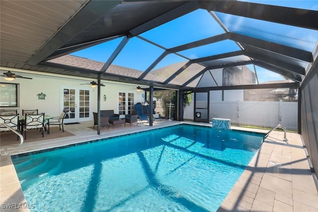 1528 SW 52nd Ln, Cape Coral, FL 33914 - swimming pool with french doors, a ceiling fan, a patio, and glass enclosure