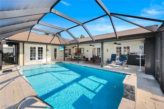 1528 SW 52nd Ln, Cape Coral, FL 33914 - swimming pool featuring french doors, a ceiling fan, a patio area, and a lanai