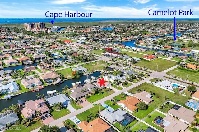 1528 SW 52nd Ln, Cape Coral, FL 33914 - aerial view of residential area with a nearby body of water