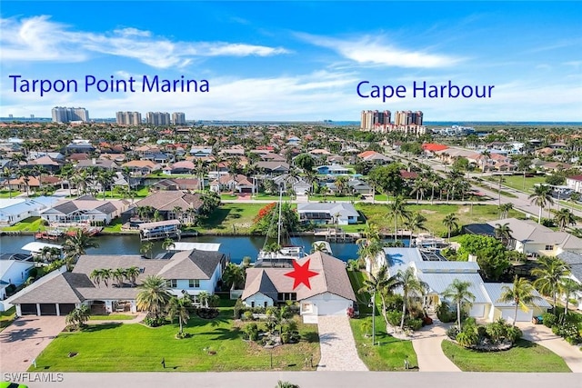 1528 SW 52nd Ln, Cape Coral, FL 33914 - aerial view of residential area with a large body of water