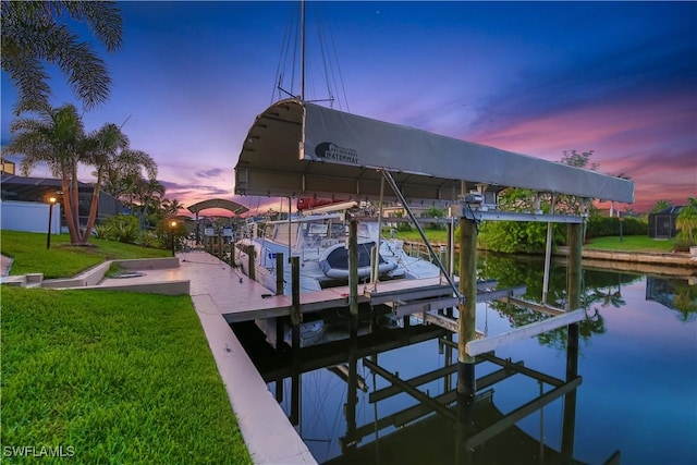 1528 SW 52nd Ln, Cape Coral, FL 33914 - dock area with boat lift, a yard, and a water view