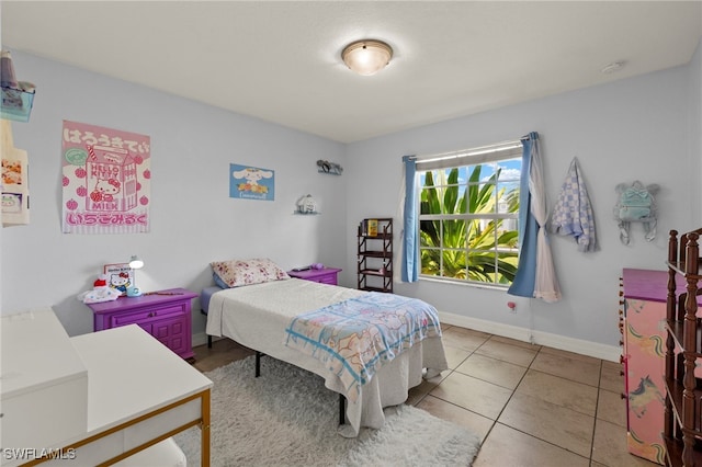 1226 SW 15th Ter, Cape Coral, FL 33991 - tiled bedroom with baseboards