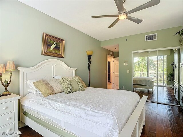 1131 Swallow Ave Unit 3-202, Marco Island, FL 34145 - bedroom with access to exterior, dark wood-style floors, and a ceiling fan