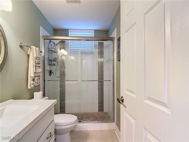 1131 Swallow Ave Unit 3-202, Marco Island, FL 34145 - full bath featuring a stall shower, tile patterned flooring, and vanity