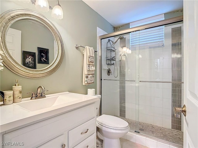 1131 Swallow Ave Unit 3-202, Marco Island, FL 34145 - full bathroom featuring a shower stall and vanity