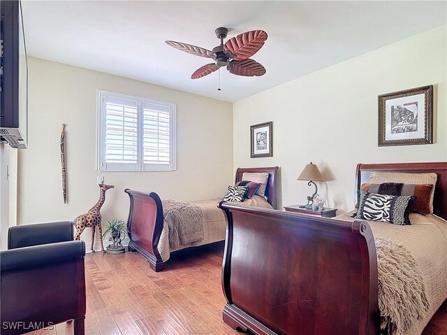 1131 Swallow Ave Unit 3-202, Marco Island, FL 34145 - bedroom featuring wood finished floors and a ceiling fan