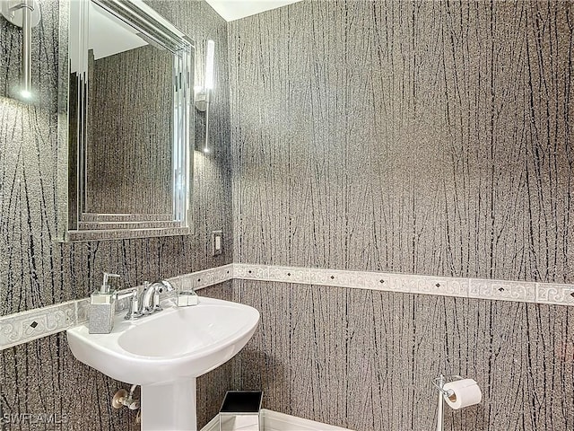 1131 Swallow Ave Unit 3-202, Marco Island, FL 34145 - bathroom featuring a sink