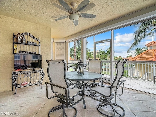 1131 Swallow Ave Unit 3-202, Marco Island, FL 34145 - sunroom / solarium with a textured wall, tile patterned flooring, and a textured ceiling