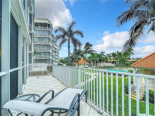 1131 Swallow Ave Unit 3-202, Marco Island, FL 34145 - balcony with view of pool area