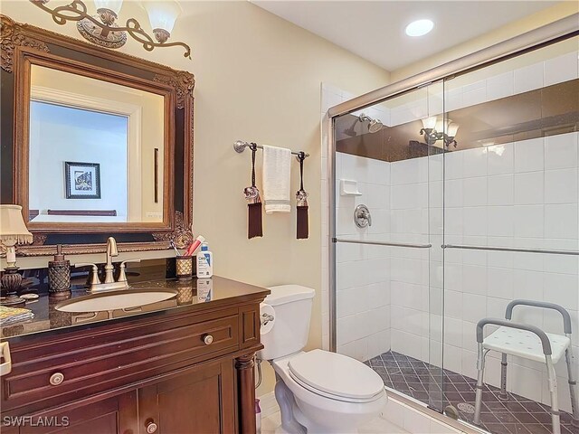 1131 Swallow Ave Unit 3-202, Marco Island, FL 34145 - full bath featuring vanity, a stall shower, and recessed lighting