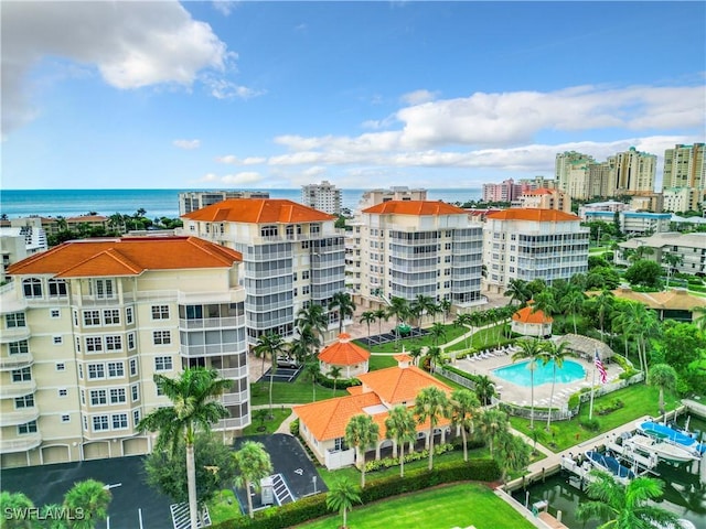 1131 Swallow Ave Unit 3-202, Marco Island, FL 34145 - aerial view of a pool area and a large body of water