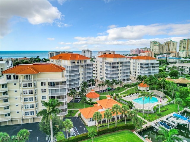 1131 Swallow Ave Unit 3-202, Marco Island, FL 34145 - drone / aerial view of a pool and a large body of water