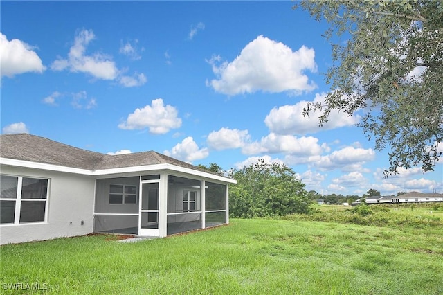 4016 35th St SW, Lehigh Acres, FL 33976 - view of green lawn with a sunroom