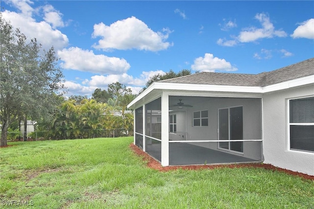 4016 35th St SW, Lehigh Acres, FL 33976 - view of yard featuring a sunroom and ceiling fan