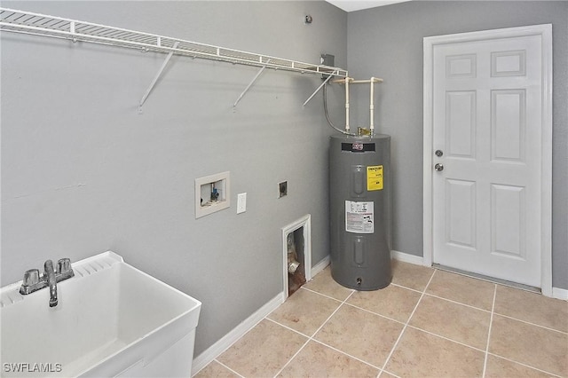 4016 35th St SW, Lehigh Acres, FL 33976 - washroom featuring electric water heater, hookup for an electric dryer, washer hookup, light tile patterned floors, and baseboards