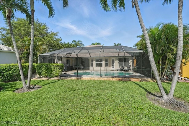 902 Marble Dr, Naples, FL 34104 - back of house with a yard, an outdoor pool, and a lanai
