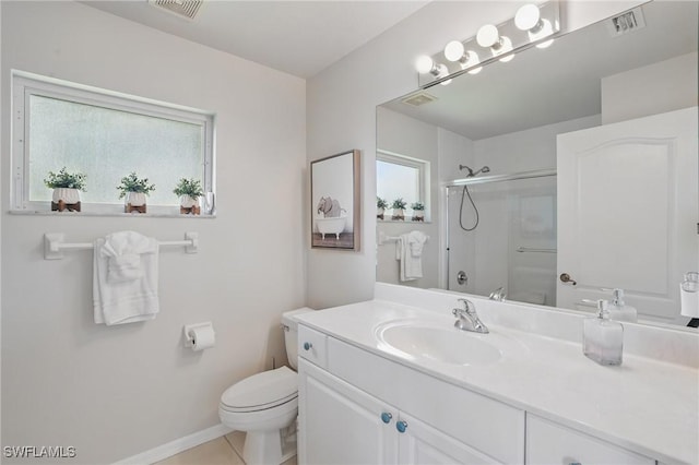 902 Marble Dr, Naples, FL 34104 - bathroom featuring a shower with shower door, vanity, and tile patterned floors