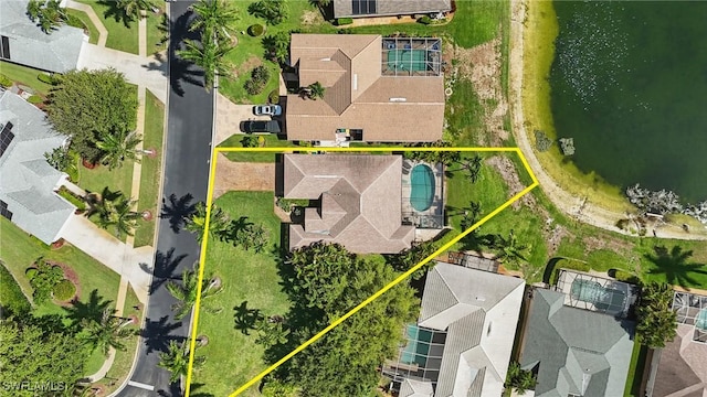 902 Marble Dr, Naples, FL 34104 - aerial perspective of suburban area featuring property parcel outlined and a nearby body of water